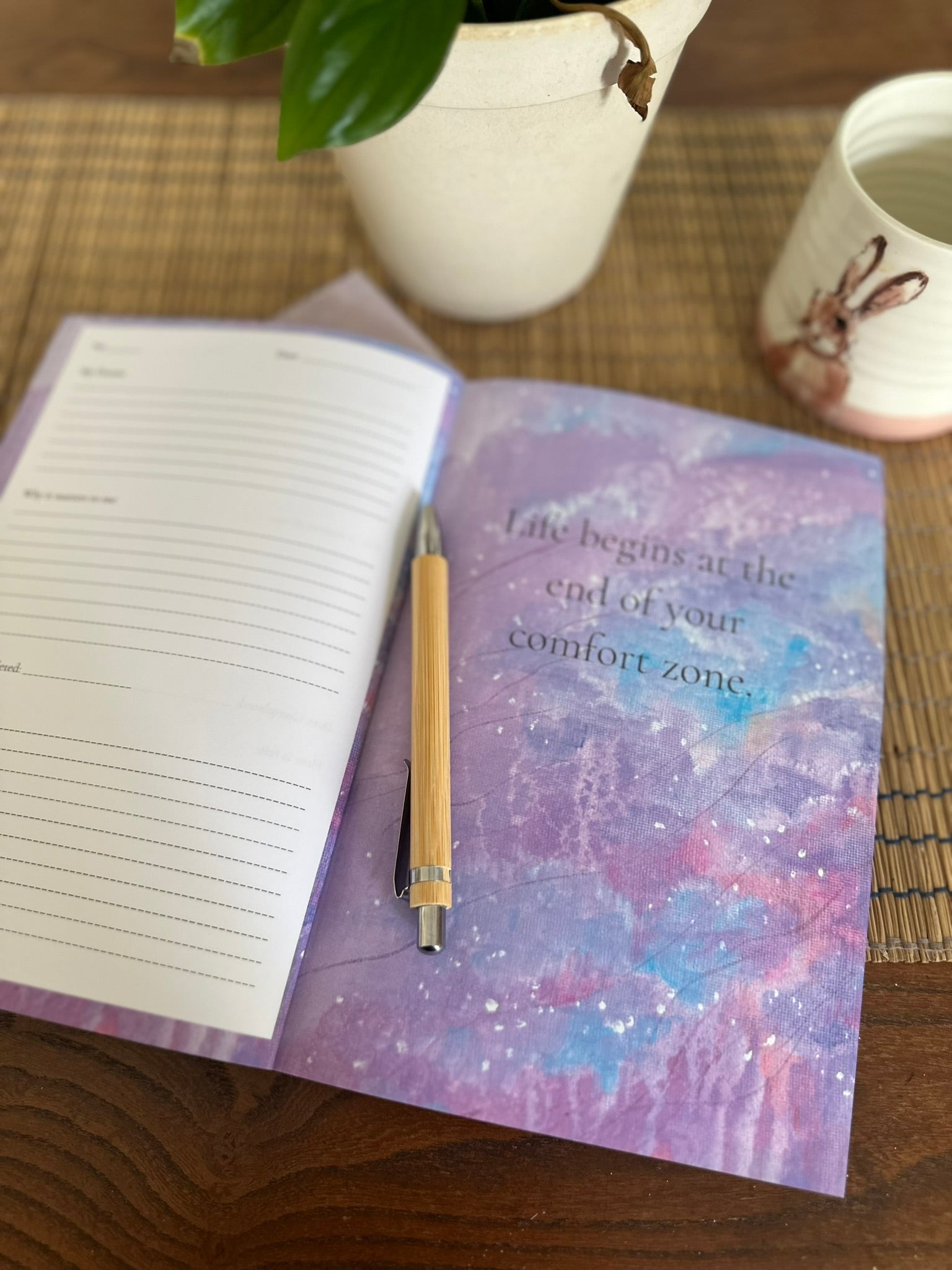 Inside the Into the Wild book by Julie Hogarth-Jones showing a quote page alongside a blank writing page. 